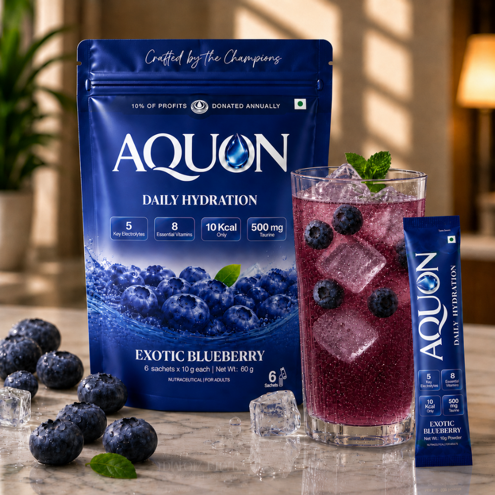 AQUON Exotic Blueberry electrolyte hydration pouch with a glass of the blueberry drink